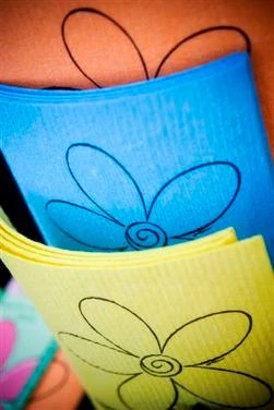 Picture of SKOY cloths in orange, blue and yellow